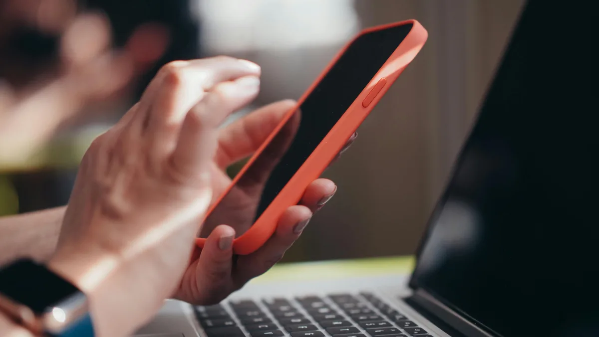 A smartphone and laptop